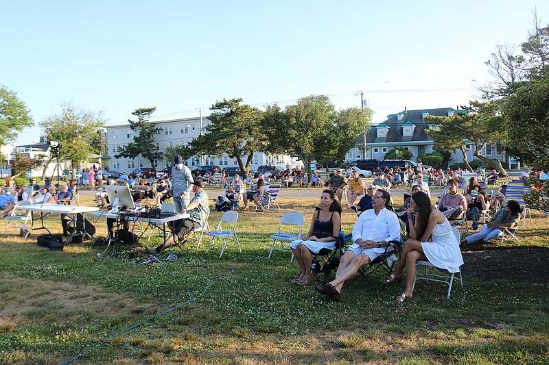 Crowds gather while adhering to COVID-19 social distancing rules to watch the program and honor OCHS graduating seniors.