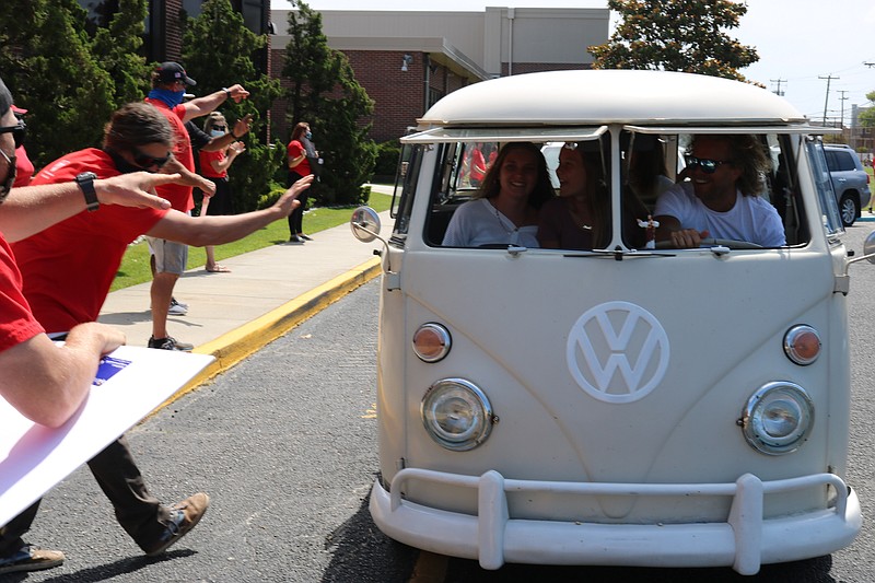 Ocean City Intermediate School faculty members cheer on eighth graders in a processional to celebrate their graduation.