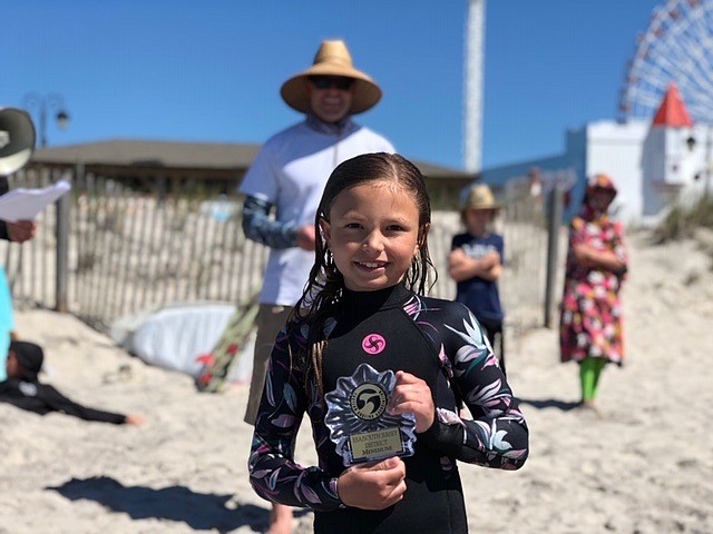 Surfer Keira Linthicum, of Ocean City, smiles after a victorious day. (Photo courtesy ESA)