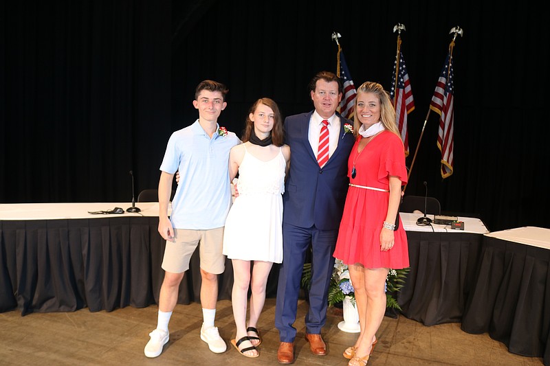 First Ward Councilman Michael DeVlieger is joined by his wife, Jennifer, son, Flynn, and daughter, Reagan, after being sworn in to a new term in 2020.