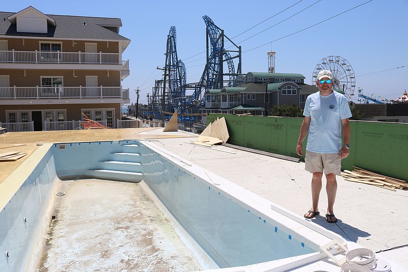 Hotel owner Christopher Glancey stands on the pool deck that will feature views of the Boardwalk and ocean from the second level.