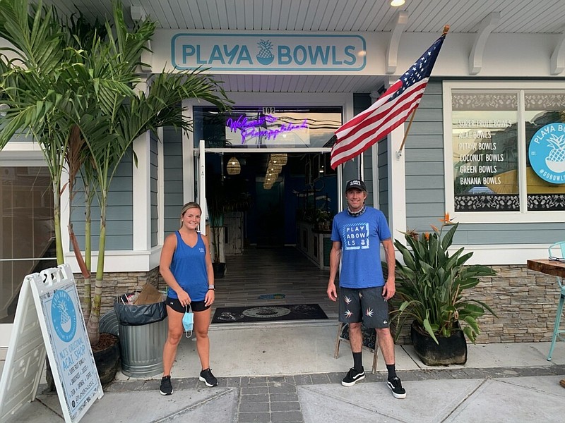 Playa Bowls owner Joe Wallash is joined by employee Natalie McNamara outside of the Sea Isle store. (Photo courtesy Joe Wallash)