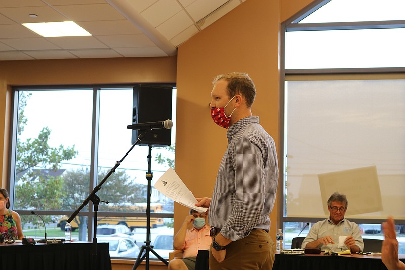 Wearing a face covering for protection from the coronavirus, Dan Kelchner, director of Ocean City's Community Services, outlines plans for a new program for schoolchildren during remarks to City Council.