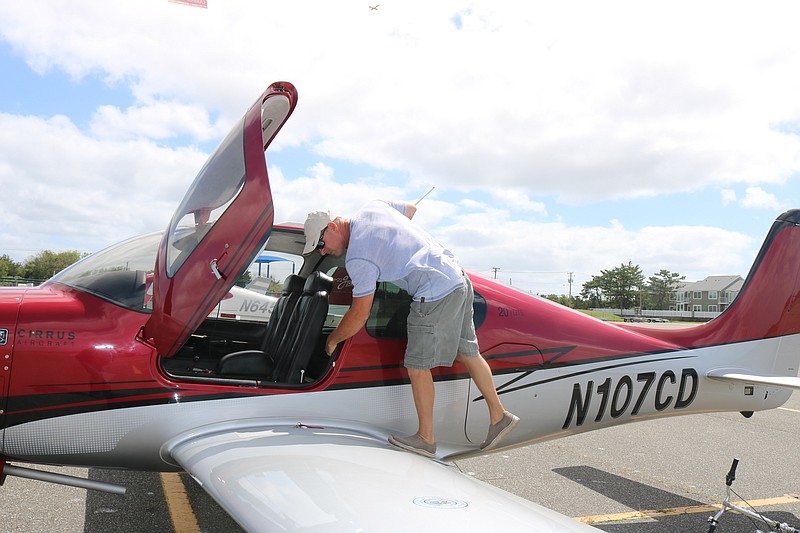 Pilot Joe Fornara checks out his Cirrus SR20 before a flight from Ocean City Municipal Airport in 2020.