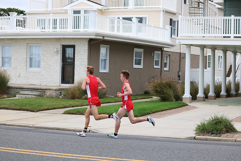 Tyler Greene (left) and Owen Ritti out on the home course. Ritti and Greene would finish 1-2 for the Red Raiders.