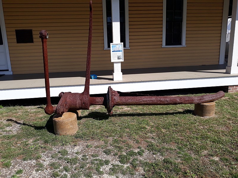 The top of the rudder post recovered from the remains of the 1901 Sindia shipwreck is on display on the museum grounds.