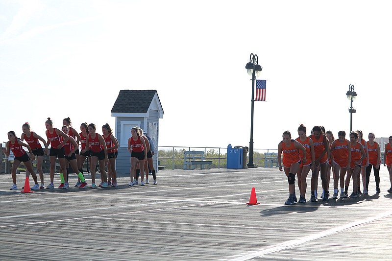 The girls line up on the Boardwalk for the start of the race.