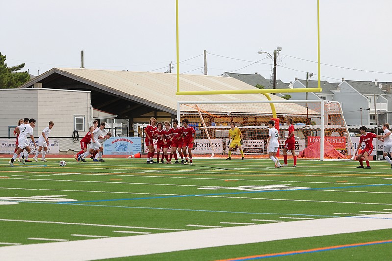 Ocean City's defense readies itself for Mainland's free kick.