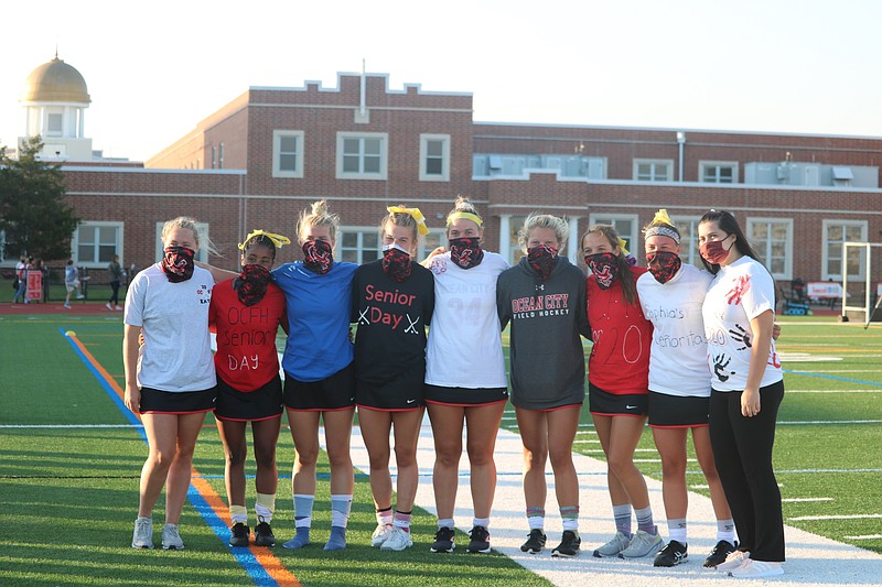 Ocean City honors its senior class, from left, Katie Bowman, Nya Gilchrist, Morgan Decosta, Tara McNally, Chelsea Stack, Alexis Smallwood, Tess Grimley, Sophia Ruh and Jill Perry.