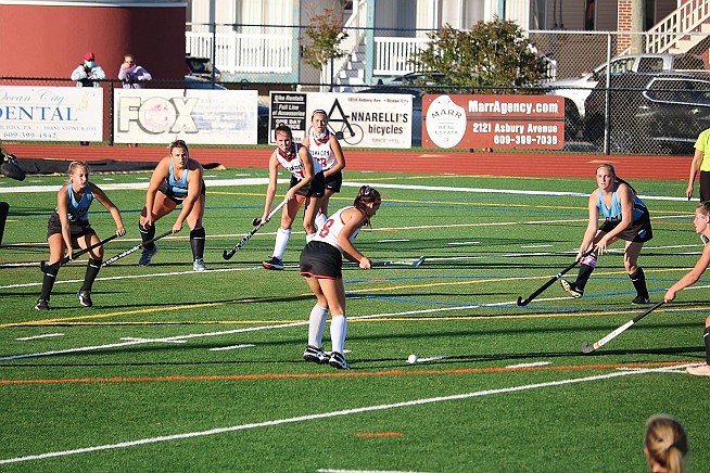 Nicole Carey takes a shot at the ball into the offensive circle. 