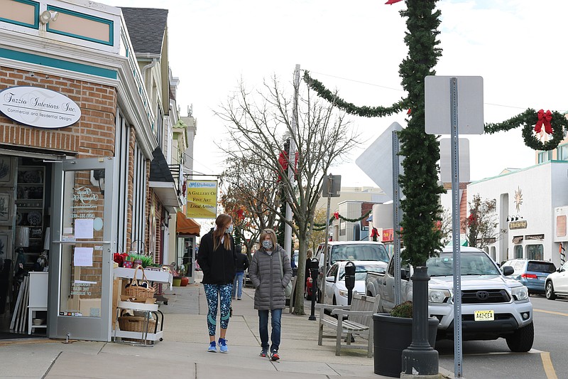 A gift card drive to help those struggling will also give local merchants a boost. 