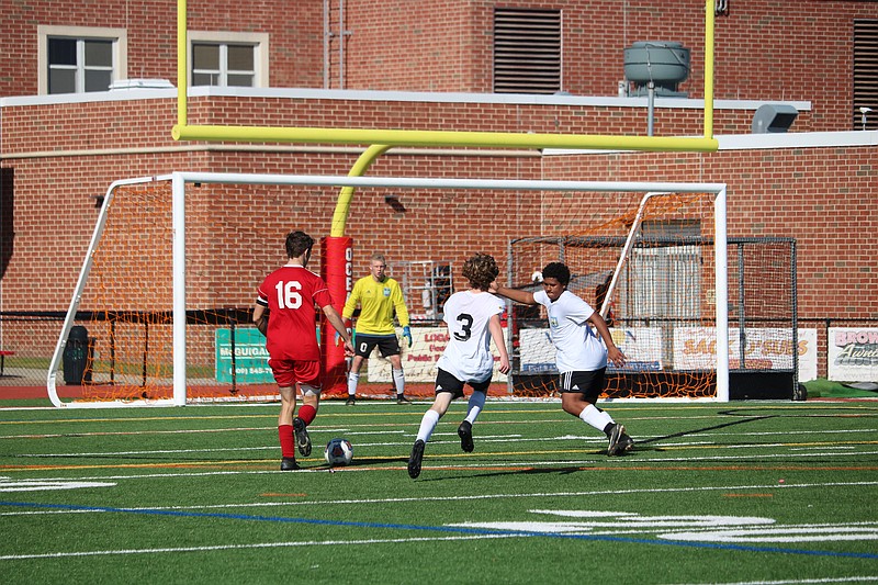 John Lindsay dribbles his way to an open shot on goal.