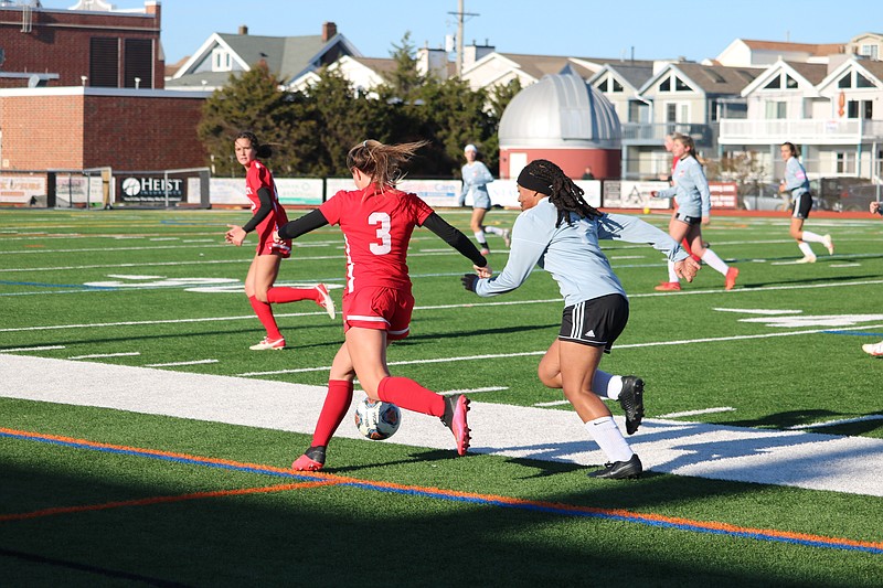 Red Raider Kamryn Chisholm dribbles the ball up the wing.