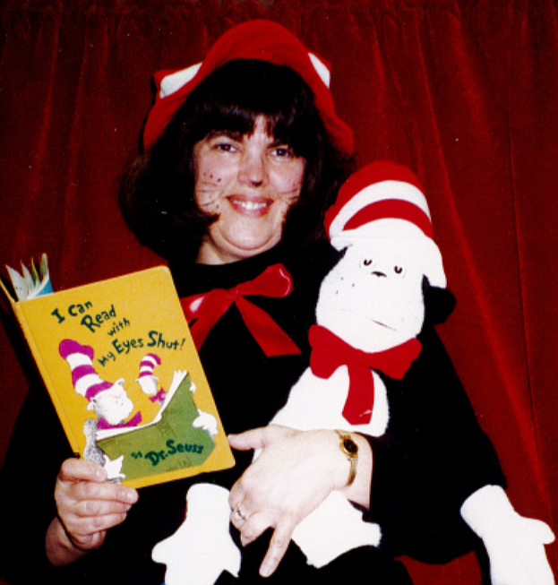 Leslie Clark poses in a photo of her in costume for story time.(OCFPL Facebook page)