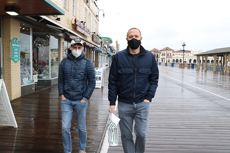 Kyle Forcinito and Ben Wade, both of Shamong, stoll down the Boardwalk after buying candies for gift-giving.