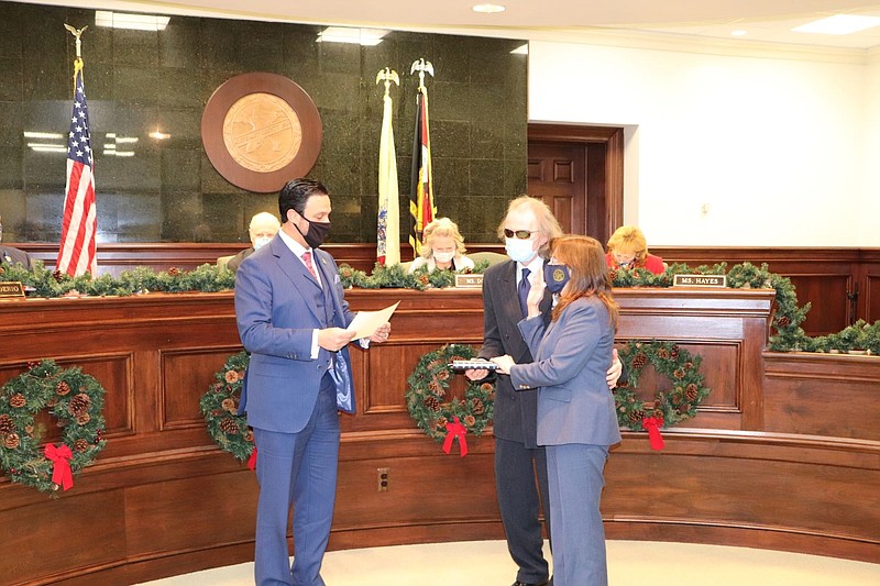 Cape May County Clerk Rita A. Rothberg is sworn in to another term by Senator Michael L. Testa. 