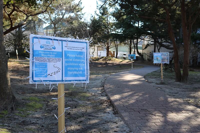 StoryWalk allows families to read a book together page by page as they stroll through Lake Memorial Park.