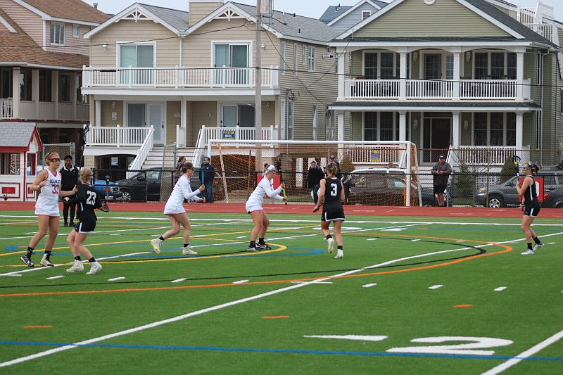 Fans will again be allowed to watch the Ocean City girls lacrosse team and other spring sports in person, due to a change in state policy.