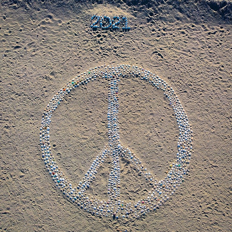 The peace sign grew as visitors left shells.