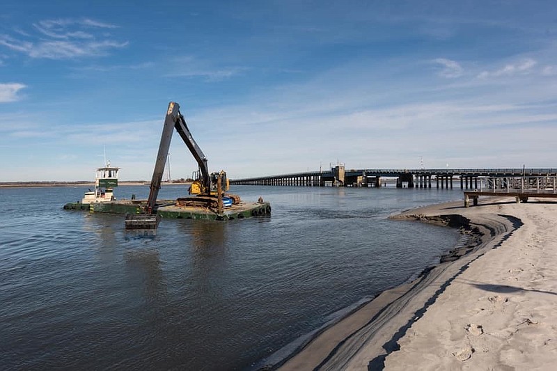 The dredging and dock re-installation project is ahead of schedule and should be ready by the beginning of April. (Courtesy of Deauville Inn)