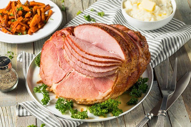 Honey glazed ham is the main course in the Easter dinner. (Photo courtesy iStock)