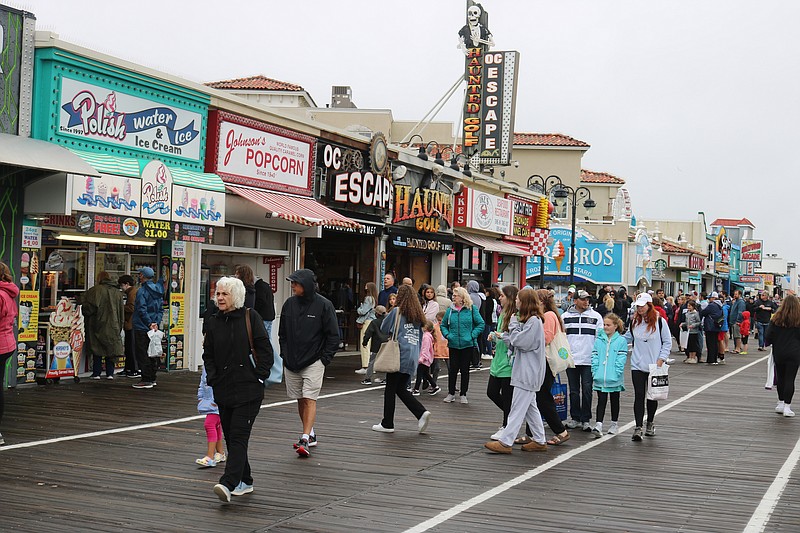 People make the most of a soggy weekend with the Boardwalk and beaches in Ocean City.