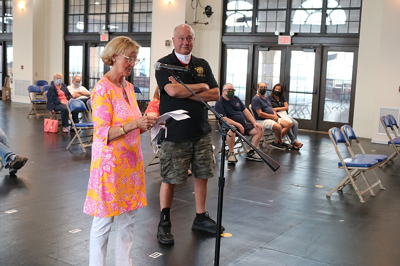 Linda Shaneor, president of the Ocean Aire Condominium Association, tells Council that the project would not be possible without the city's help back in May. Steve Sinibaldi is also pictured.