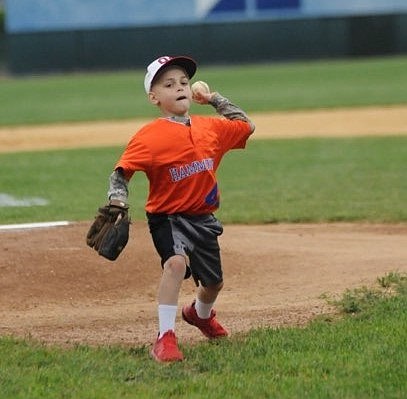 Frankie LaSasso, 7, of Hammonton, who is battling cancer, throws out the first pitch at the Fight Like Frankie Showcase. (Photos courtesy of Frank LaSasso)