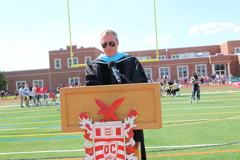 Matthew Jamison in 2021 as he gives his last graduation remarks before retiring from the district. 