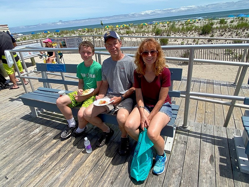 From left, Andrew, Al and Karen Rauch of New Hope, Pa., enjoy their Boardwalk pizza.