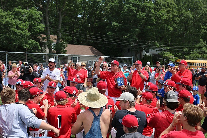 Coach Andrew Bristol speaks to the team after the Mainland victory about how to prepare to win states.  The team is now one victory away from their goal. 