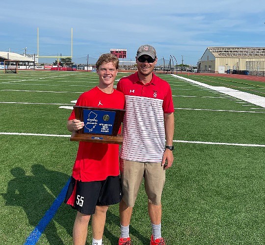 Jake Schneider is pictured with Coach Joe LaTorre after the game.  Schneider tied Marty Cattie for the school's scoring record (200) in the game.