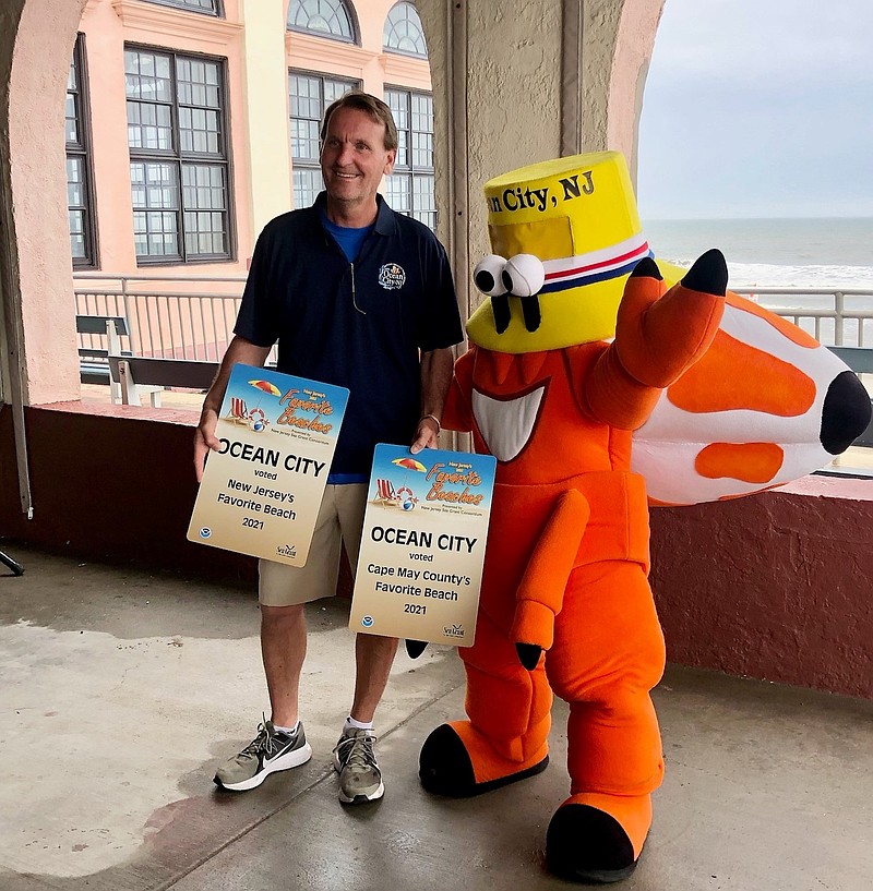 Mayor Jay Gillian and Ocean City mascot Martin Z. Mollusk accept the New Jersey's "Favorite Beach" award. (Photo courtesy of Ocean City Regional Chamber of Commerce)