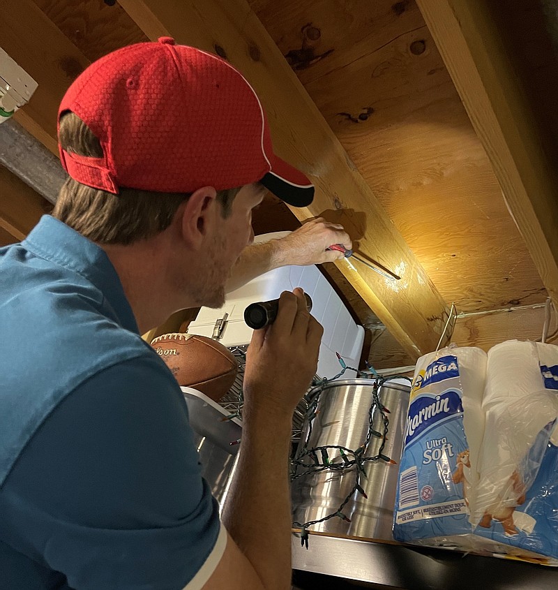 Charles Gardiner inspects a home. (Photo courtesy of Superior Pest Solutions)