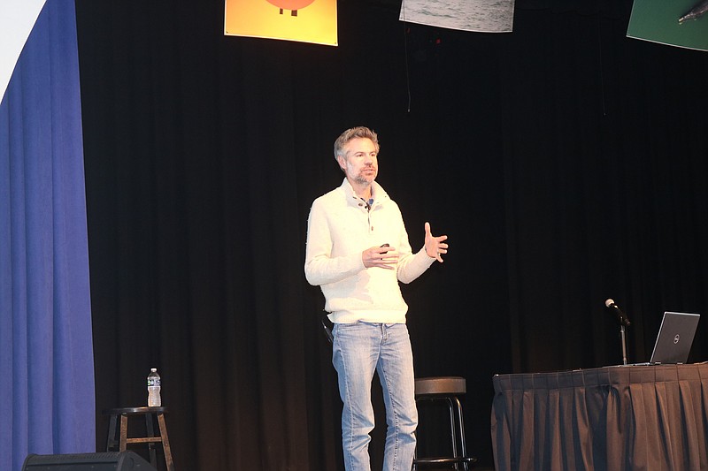 Michael Shellenberger speaks to an audience at the Music Pier about his views on wind farms.