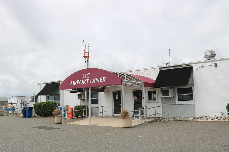 The city's five-year capital includes a new airport terminal, which will also include a restaurant, in place of the existing building pictured here.