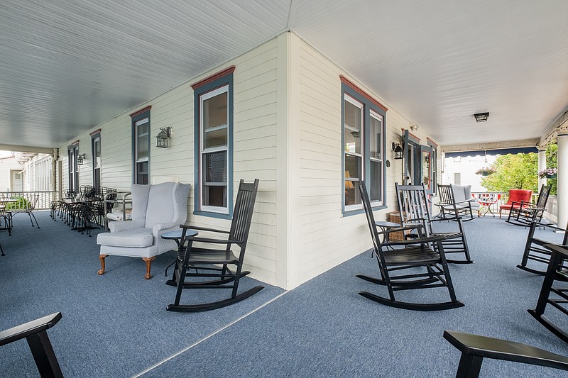 The wraparound porch becomes the center of socializing and relaxing.