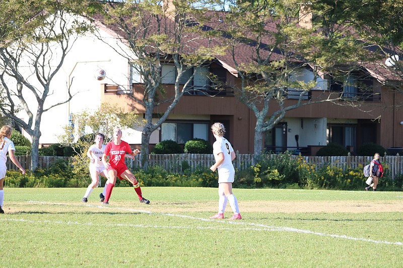 Summer Reimet (20) prepares to play the ball.