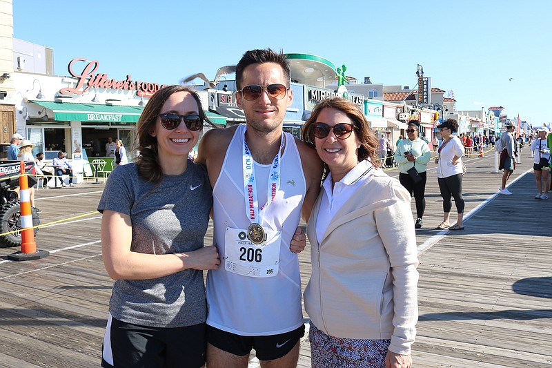 Half Marathon winner Mike Horgan with his girlfriend, Bailey Ford, both of Philadelphia, and mother, Anne Marie Horgan, of Washington Crossing, Pa. 