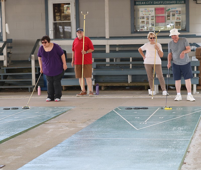 A good game of shuffleboard also comes with a lot of camaraderie. 