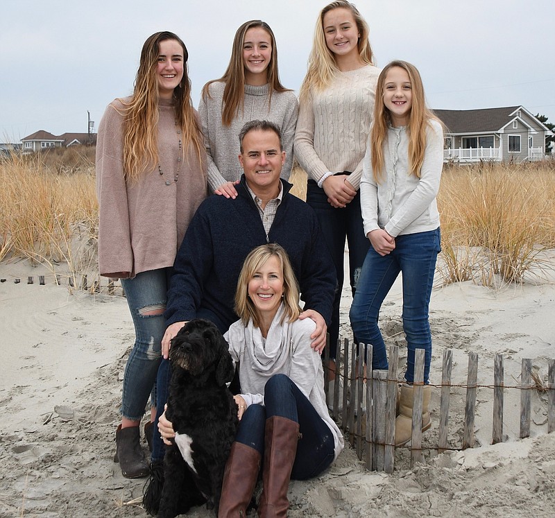 Catherine and William Panico with their children from left, Avery, 20, Paige, 18, Marin, 17, and 13-year-old Brooke with their family dog, Buddy. (Photo courtesy Catherine Panico)