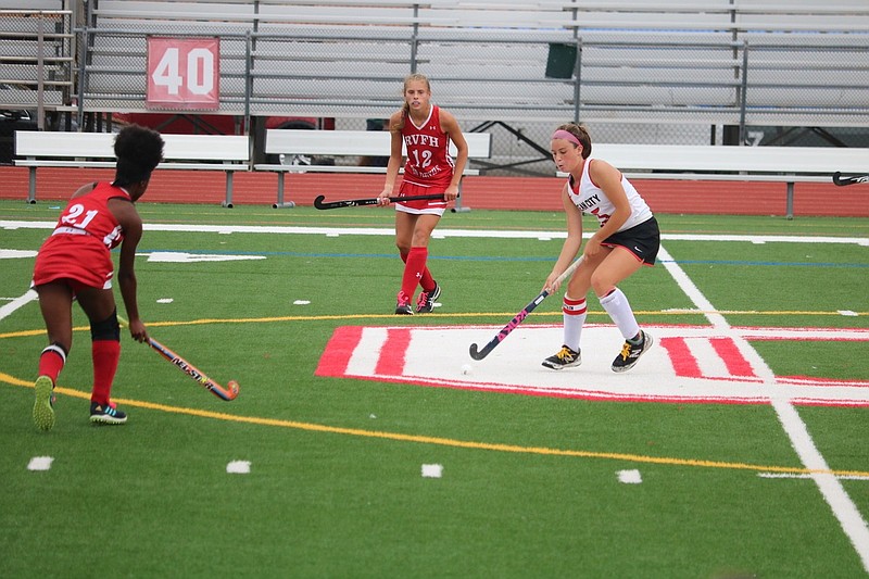 Balanced scoring and good ball control help the Red Raiders hockey team.