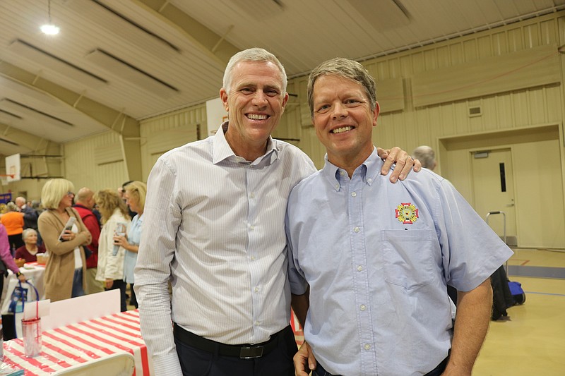 Tom Heist, of Heist Insurance Agency pauses for a photo with Lt. Col. Tom Dahl.