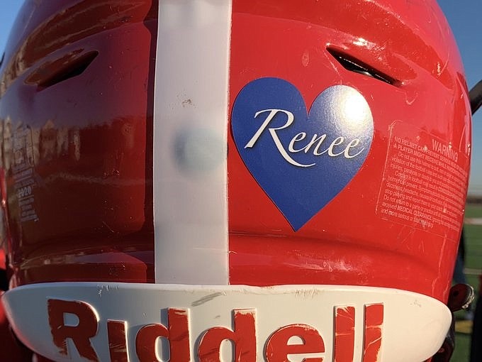 The Red Raiders wore "Renee" stickers on their helmets in memory of 3-year-old Renee Monihan, who died Nov. 13 in a tragic accident.