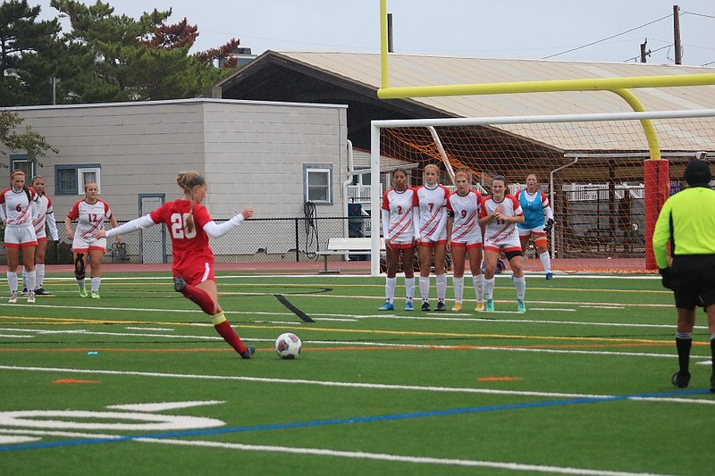 Summer Reimet prepares for a free kick that resulted in one of her four goals on the afternoon.