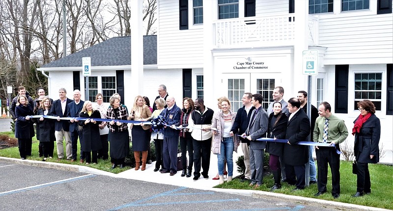 Cape May County Chamber of Commerce members and other officials cut the ceremonial ribbon for the renovated headquarters. (Photo courtesy of Martin Fiedler)