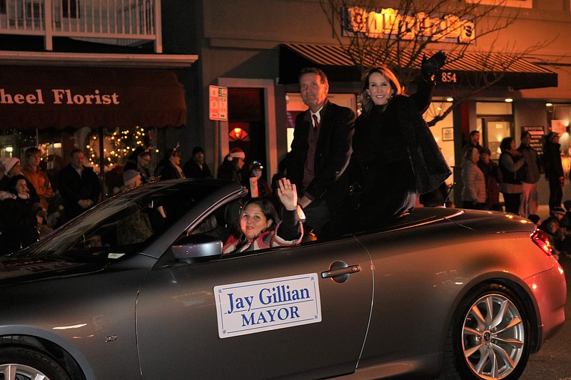 Mayor Jay Gillian and Michele Gillian, executive director of the Ocean City Regional Chamber of Commerce, wave to the crowd.