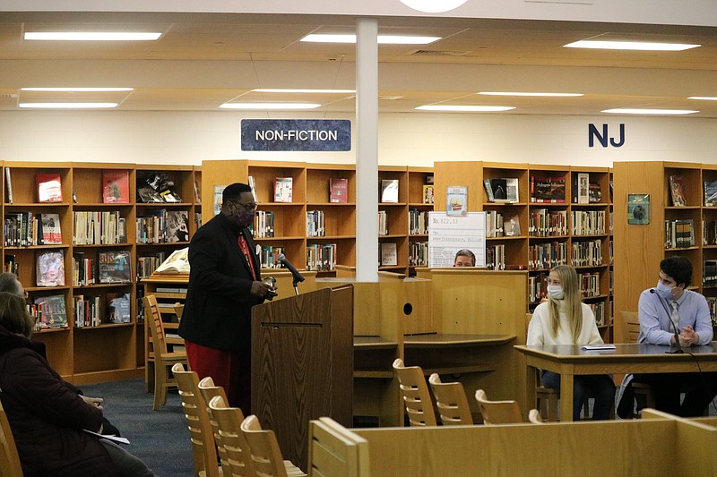 Retiring special education teacher Myron Jenkins addresses the board.