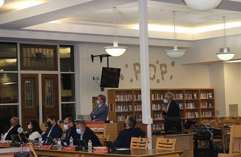 A representative from SEA Frank Auriemma presents his findings to the board during the Jan. 26 meeting.