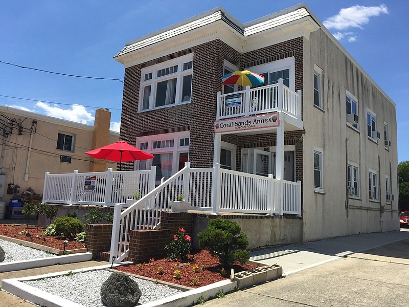 There are plans for a triplex at this 828-830 Atlantic Ave. property. (Photo courtesy of thecoralsandsmotel.com)